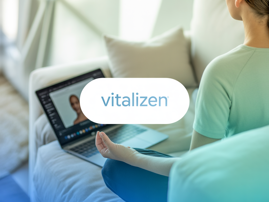 A person using an online yoga and meditation subscription on their laptop at home to practice mindfulness.